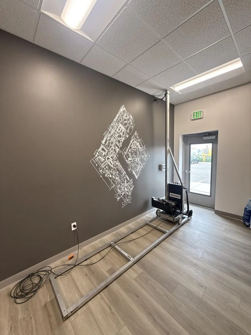 Render wall printer after printing the Black Diamond logo on a store wall